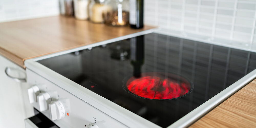 Electric oven repair engineer replacing faulty heating element in Birmingham Electric oven repair engineer replacing faulty heating element in Birmingham